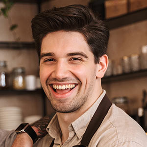 Manlig barista